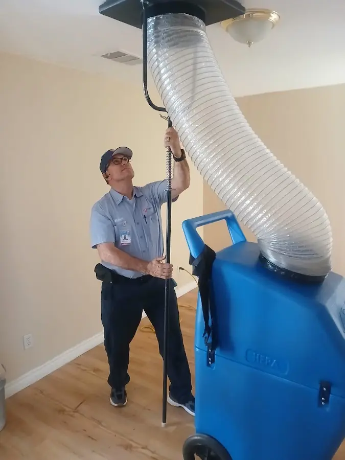 HVAC Installation technician using HEPA equipment in Broussard